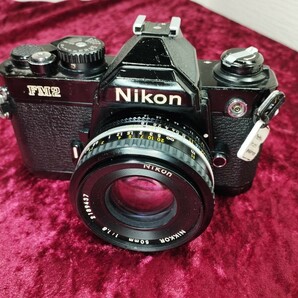 【委託品】 Nikon NEW FM2 Ai NIKKOR 50mm 1.8 フィルムカメラ シャッターOK 速度変化有り ニコン レンズ付き 1円スタート売り切りブラックの画像1