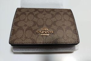 COACH オリガミ スモール トライフォールド ウォレット シグネチャー コーテッド カーキ/サドル 2