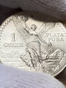 N009*. side adjustment **[1985 year 1 ounce Mexico . profit. woman god silver coin ] *