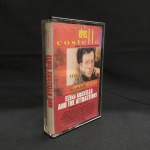 ELVIS COSTELLO / PUNCH THE CLOCK ( music tape )