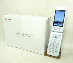 0233【充電器付きフルセット/極めて美品/SIMロック解除済み】らくらくホン　F-01M　ホワイト　卓上ホルダF49