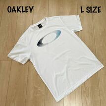 OAKLEY オークリー 半袖Tシャツ メンズ　Lサイズ　ホワイト　白　速乾　シャツ　スポーツウェア_画像1