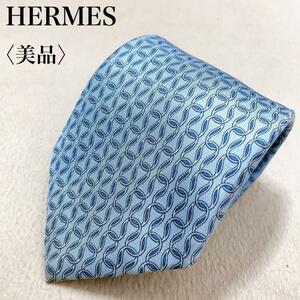 【美品】HERMES エルメス ネクタイ フランス製 シルク100％ メンズ 高級感 ハイブランド paris 総柄 SOIE 肌触り ワンポイントロゴ L02