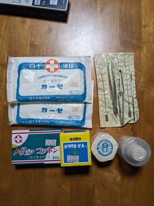  medical care retro medicine box contents tweezers bandage gauze bandage white 10 character therapeutics device . first-aid kit 