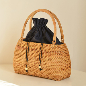  basket back oval bag . bag net fee bag natural material cane basket tote bag . bag inside cloth attaching hand made 