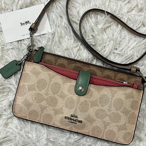 希少カラー COACH コーチ ノア ポップアップメッセンジャー ウォレットショルダー 財布 シグネチャー 総柄 バイカラー 