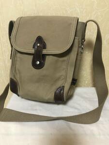 *. hill bag STITCH ON stitch on khaki canvas shoulder bag one part leather beautiful used size length width ..24X19X9.