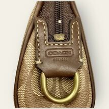 【美品】 COACH ポーチ シグネチャー 小物入れ 化粧ポーチ チャーム 馬車　コーチ　ブラウン系　_画像6