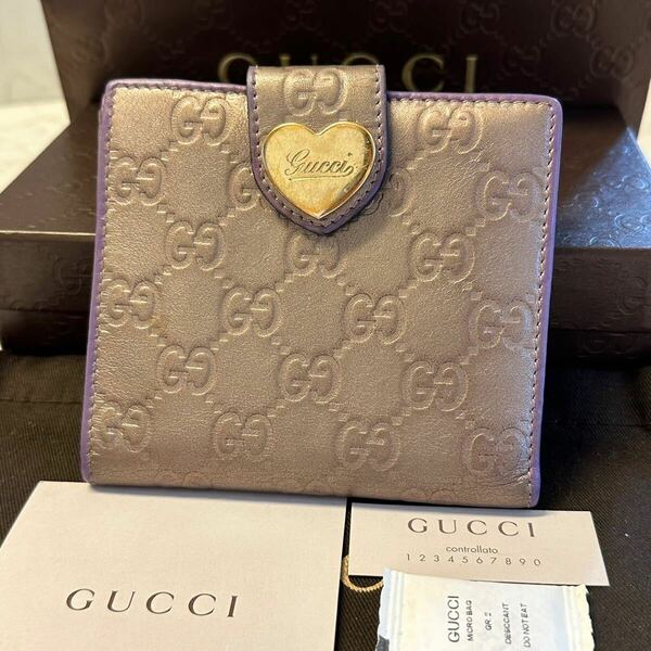 グッチ　GUCCI 財布　二つ折り　折り財布　シマレザー　ハート金具　レディース