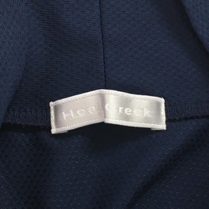 【美品】ヒールクリーク 半袖ハイネックシャツ ネイビー×ブルー 胸元ロゴ 織生地 レディース 42(L) ゴルフウェア Heal Creekの画像4