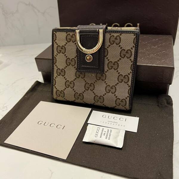 グッチ　GUCCI 財布　二つ折り　折り財布　GGキャンバス　レディース