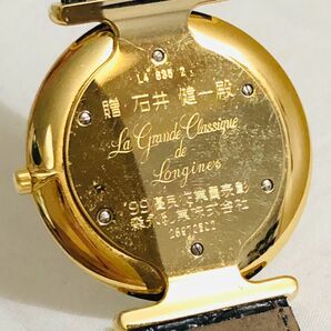 yt1035【60】//★美品 LONGINES ロンジン グランドクラシック クオーツ 白文字盤 メンズ腕時計 L4.635.2 名入り 取説付きの画像8