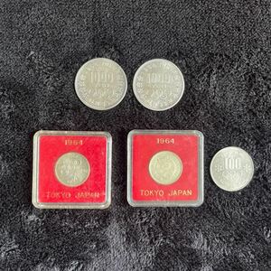 東京オリンピック硬貨1000円2枚と100円硬貨2枚、札幌オリンピック100円硬貨1枚