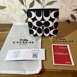 新品未使用 COACH 二つ折り財布　箱、ショッパー、保存袋付き