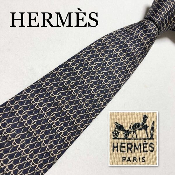 HERMES エルメス　ネクタイ　金具　総柄　シルク100% フランス製　ネイビー×ベージュ　ビジネス