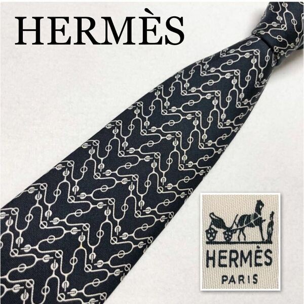 HERMES エルメス　ネクタイ　金具　総柄　シルク100% フランス製　ブラック×ホワイト　ビジネス