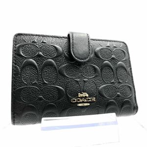 ■極上美品■COACH コーチ　エンボス加工　シグネチャーPVC×レザー　二つ折り財布　ブラック　ゴールド金具　タグあり　F67565