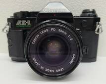 【YYD3593OM】1円～ 中古 Canon キャノン AE-1 PROGRAM/LENS FD 35mm 1:2 ほかズームレンズ1点 フィルムカメラ コレクション 動作未確認_画像2