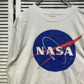 AFDD 1スタ 白 プリント 長袖 Tシャツ ロンT ナサ NASA 宇宙 ロゴ 90s 00s ビンテージ アメリカ 古着 ベール 卸 仕入れの画像1