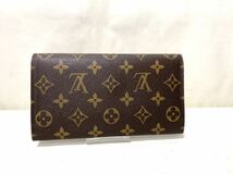 1 新品同様未使用保管品LOUIS VUITTON ルイヴィトン M61215 モノグラム ポルトトレゾール インターナショナル 三つ折り 長財布 ウォレット _画像2