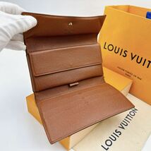 2755【美品】LOUIS VUITTON ルイヴィトン モノグラム ポルトトレゾール インターナショナル 長財布 三つ折り財布　M61215/MB0054_画像3