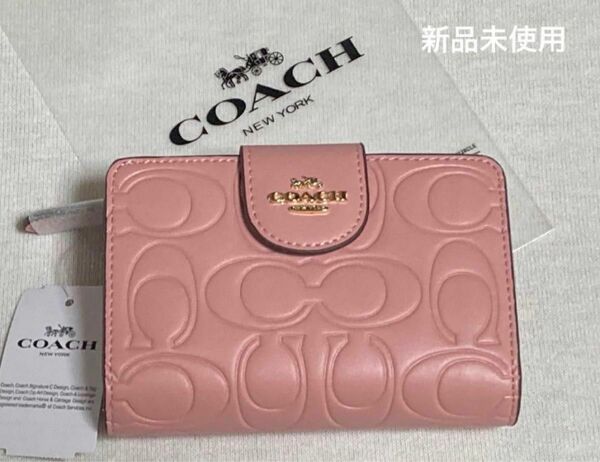 新品 COACH コーチ 二つ折り財布 シグネチャー　ピンク　CM241