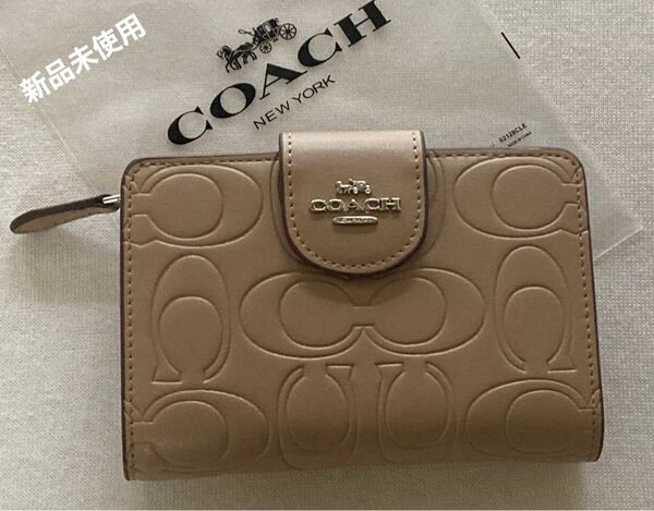 新品 COACH コーチ 二つ折り財布 シグネチャー　ベージュ　CM241