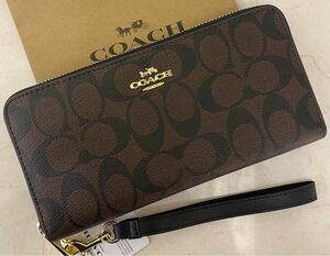 [新品未使用]COACHシグネチャー柄ラウンドファスナー長財布　ストラップ付き　ギフトボックス付き