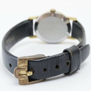 2404-661 オメガ 手巻き式 腕時計 OMEGA ジュネーヴ 金色文字盤 オーバル型 金色ケース 純正ベルトの画像7