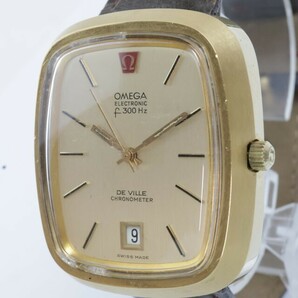 2404-600 オメガ 電磁テンプ 腕時計 デビル エレクトロニック f300Hz 金色 日付の画像1