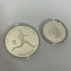【H71499】記念メダル 記念硬貨 記念コイン 2枚セット！ 1988年 ソウルオリンピック 硬貨  ケース付き 現状品の画像2
