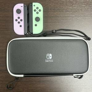 #13464 Nintendo Switch コントローラー パープル グリーン ソフトケース 付属品 アクセサリー 動作未確認 中古品の画像1