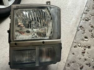  Isuzu Giga original head light left passenger's seat side 