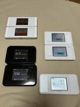 au (まとめて7台)中古Wifiルーター W05(HWD36)×2 WX05(NAD35)×2 W06(HWD37) W07(SHD31)×2_画像1