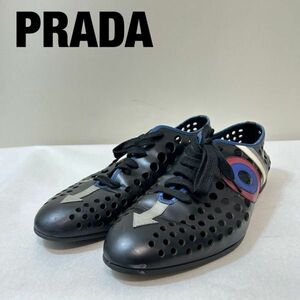 JJ0008★10.5 美品 PRADA プラダ 名作 パンチング レザー ドレス シューズ ローファー 靴 黒 総柄ロゴ ブラック 9サイズ 2EG163