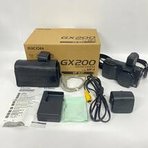 1円~【通電確認済】リコー RICOH GX200 With VF-1 VF KIT ZOOM LENS f=5.1-15.3mm 1:2.5-4.4 コンパクトデジタルカメラ 付属品あり G142839_画像1