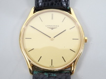 ジャンク LONGINES ロンジン グランドクラシック L4.617.2 クォーツ メンズ 腕時計 ゴールド 金 文字盤 _画像2