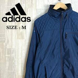 M3635 adidas アディダス　収納フード付きウィンドブレーカー　Mサイズ　ネイビー　メンズ　中綿ポリ　Climastorm アウター　上着