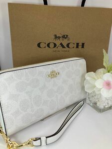 新品　未使用　COACH コーチ 　ホワイトシグネチャー　長財布　箱、紙袋付き