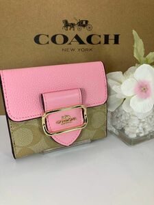 新品　未使用　COACH コーチ モーガン　ピンクベージュシグネチャースモール二つ折り財布　箱、紙袋付き