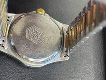 ☆396 タグホイヤー 964.013-2 QZ プロフェッショナル200M ゴールド文字盤 デイト メンズ腕時計 竜頭〇_画像4