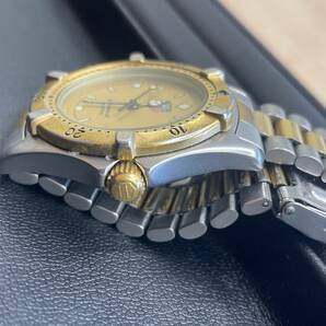 ☆396 タグホイヤー 964.013-2 QZ プロフェッショナル200M ゴールド文字盤 デイト メンズ腕時計 竜頭〇の画像3