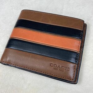 美品　coach コーチ　ブラウン　オレンジ　二つ折り財布　ボーダー　レザー　