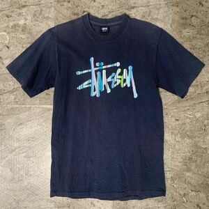 Stussy 紺タグ オールドステューシー レイボーロゴプリントTシャツ 折れクラウン バックプリント フェードネイビー 紺 ビンテージ 90s