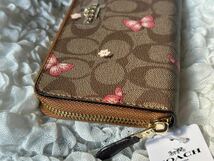 13 新品 COACH コーチ 蝶々柄 長財布 ラウンドファスナー C2858_画像3