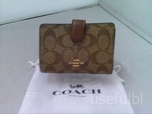 【COACH】　コーチ　二つ折り財布　コンパクト財布　シグネチャー　ブラウン系　SY02-Z63_画像1