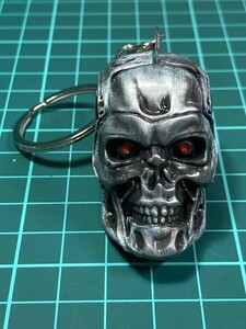 ▲棚:V_H7「キーホルダー　T-800 （ターミネーター）」アーノルド・シュワルツェネッガー 主演　sa_wjig　XC6-01