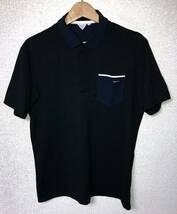 TaylorMade Golf PUNCHING POCKET S/S POLO　 テーラーメイド　ゴルフ ストレッチ 半袖 ドライ ポロシャツ Lサイズ 黒系 ブラック系 LOB88_画像1