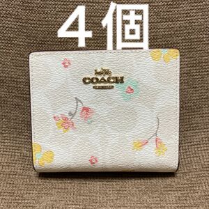 新品二つ折り財布ミニ財布ホワイト 水彩画フラワーcoach シグネチャー