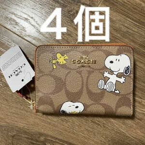 新品二つ折り財布ミニ財布スヌーピーコラボcoach シグネチャー